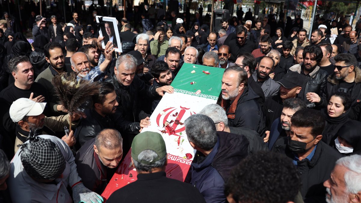 Iranians carry a coffin during the funeral for victims of the conflict between Iran, Israel and the U.S., Tehran, Iran, March 26, 2026. (EPA Photo)