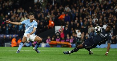 Manchester City's Rodri shoots at goal during the UEFA Champions League round 16 second leg match against Real Madrid at Etihad Stadium, Manchester, U.K., March 17, 2026. (Reuters Photo)