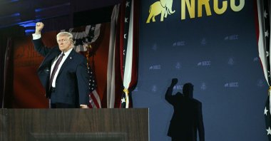 U.S. President Donald Trump raises his fist after speaking at the National Republican Congressional Committee's annual President's Dinner at Union Station in Washington, U.S. March 25, 2026. (AFP Photo)