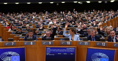 Members of the European Parliament attend a session to vote on legislation to cut import duties for U.S. products, Brussels, Belgium, March 26, 2026. (Reuters Photo)