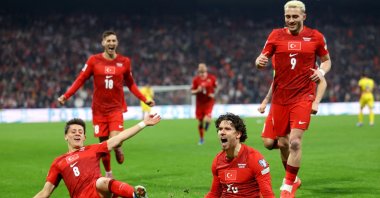 Türkiye's Ferdi Kadıoğlu celebrates with teammates after scoring their first goal against Romania at Tüpraş Stadium, Istanbul, March 26, 2026. (Reuters Photo)