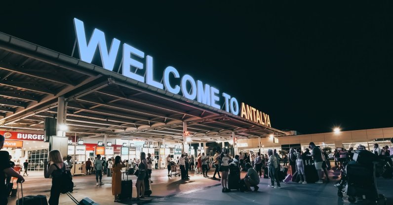 The "Welcome to Antalya" sign is seen at the arrival international terminal of the airport, Antalya, Türkiye, July 17, 2022. (Shutterstock Photo)