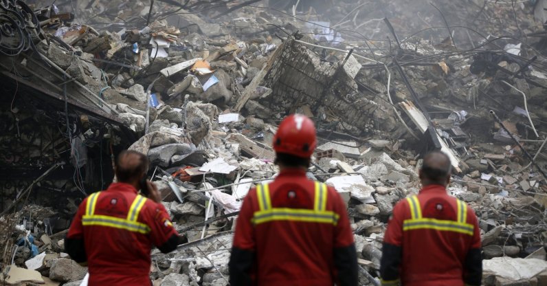 Rescue personnel work at a site destroyed by Israeli airstrikes, Tehran, Iran, March 23, 2026. (AA Photo)