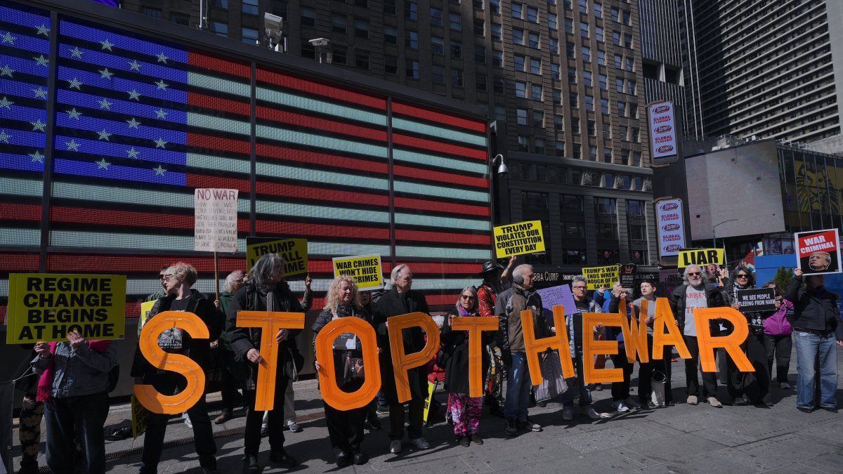 Protesters opposing the war against Iran held a demonstration near the military recruiting station, Times Square, New York City, U.S., March 22, 2026. (AA Photo)