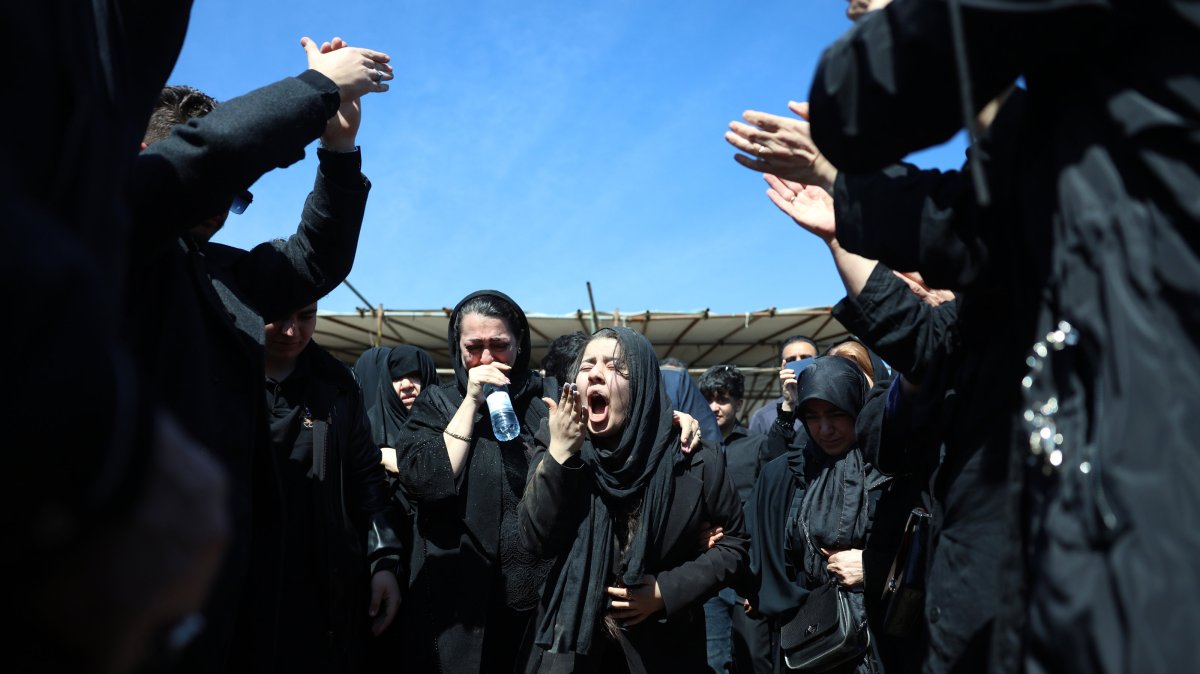 Iranians mourn during the funeral for victims of the conflict between Iran, Israel and the US, at the Behesht Zahra cemetery, Tehran, Iran, March 26, 2026. (EPA Photo)