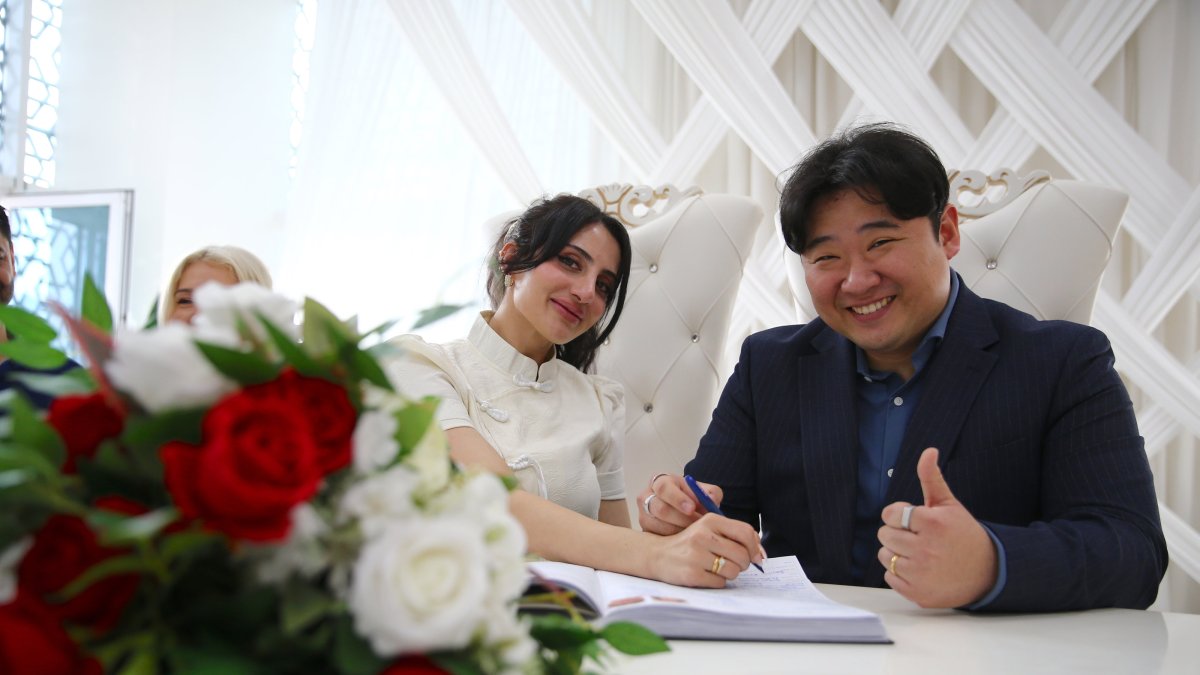 The newlyweds smile together during their wedding ceremony in Bingöl, Türkiye, March 26, 2026. (AA Photo) 