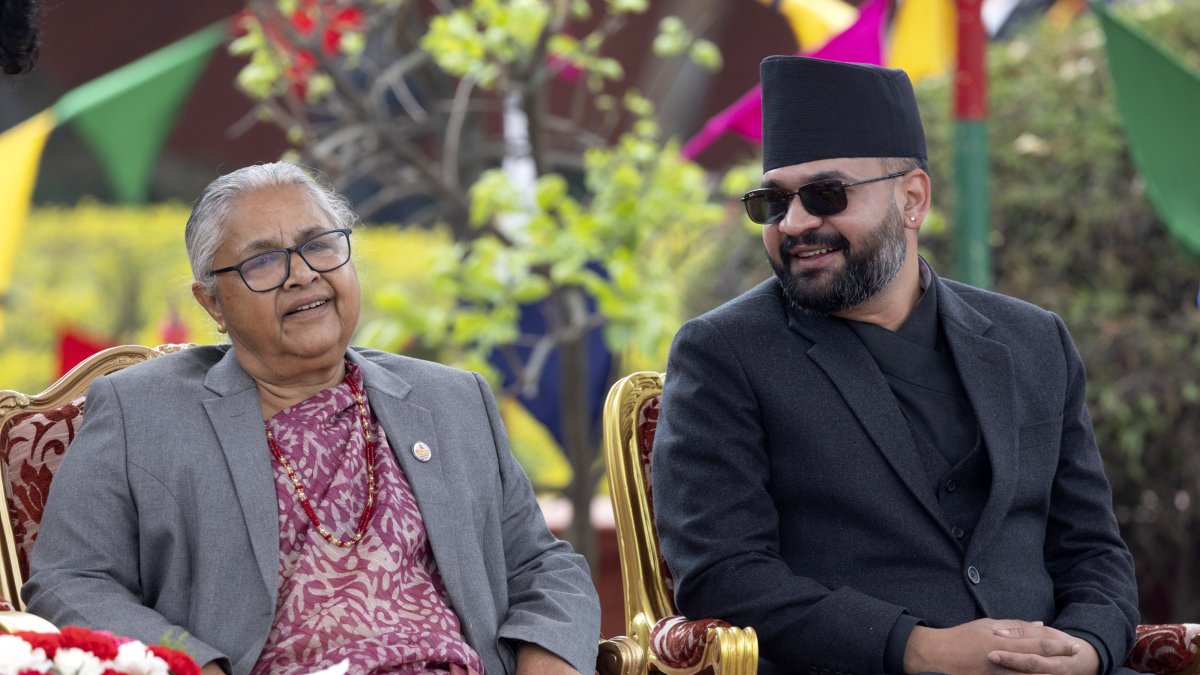 Outgoing Prime Minister Sushil Karki (L) and newly elected Prime Minister of Nepal Balendra Shah (R) after the oath-taking ceremony at the presidential office, Kathmandu, Nepal, March 27, 2026. (EPA Photo)