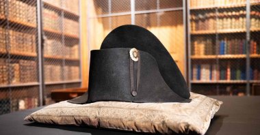 A bicorn hat, recently authenticated as worn by French Emperor Napoleon Bonaparte, during a press preview in the library of the Chateau de Chantilly, northern France, March 26, 2026. (AFP Photo)