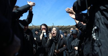 Iranians mourn during the funeral for victims of the conflict between Iran, Israel and the US, at the Behesht Zahra cemetery, Tehran, Iran, March 26, 2026. (EPA Photo)