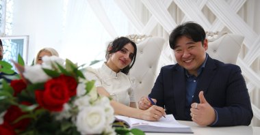 The newlyweds smile together during their wedding ceremony in Bingöl, Türkiye, March 26, 2026. (AA Photo) 