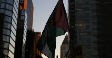 A Palestinian flag is displayed during a protest against the U.S.-Israel conflict with Iran, after the U.S. and Israel launched strikes on Iran, in New York City, U.S., March 2, 2026. (Reuters Photo)