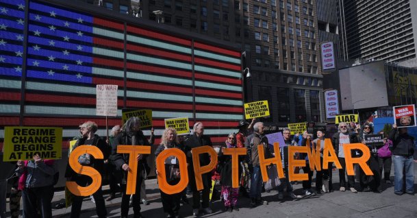 Protesters opposing the war against Iran held a demonstration near the military recruiting station, Times Square, New York City, U.S., March 22, 2026. (AA Photo)