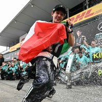 Mercedes' Italian driver Kimi Antonelli celebrates with his team after winning the F1 Japanese GP at the Suzuka circuit in Suzuka, Mie prefecture, Japan, March 29, 2026. (AFP Photo)