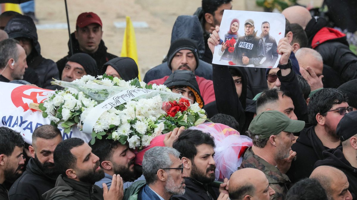 Mourners carry the body of one of the journalists killed in an Israeli strike in south Lebanon, Beirut, Lebanon, March 29, 2026. (AFP Photo)