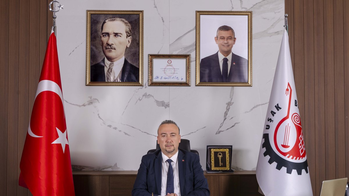 Detained Uşak Mayor Özkan Yalım poses in his office, Uşak, western Türkiye, March 19, 2026. (İHA Photo)