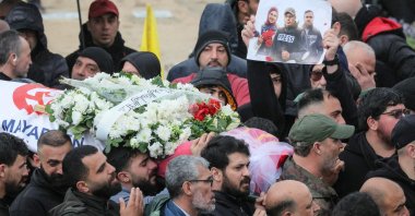 Mourners carry the body of one of the journalists killed in an Israeli strike in south Lebanon, Beirut, Lebanon, March 29, 2026. (AFP Photo)