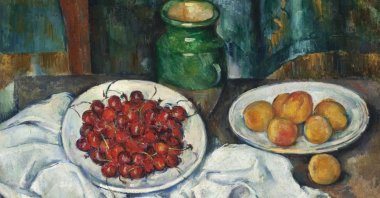 Paul Cezanne's "Still Life With Cherries And Peaches", likely made between 1885 and 1887. (Getty Images Photo)