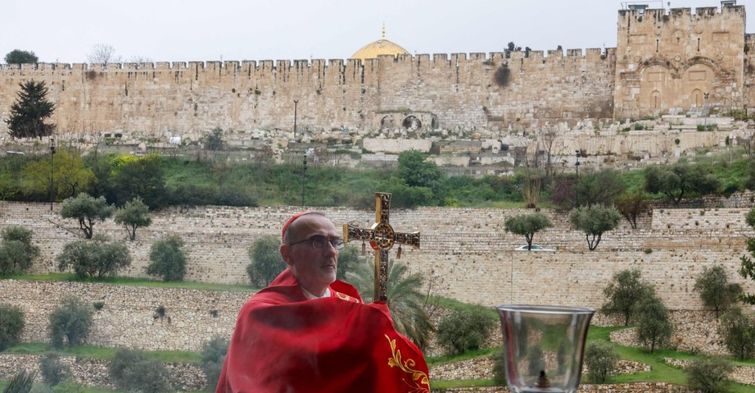 Latin Patriarch of Jerusalem, Cardinal Pierbattista Pizzaballa, leads a prayer service to mark Palm Sunday following the cancellation of the traditional Palm Sunday procession from the Mount of Olives amid restrictions on gathering in large groups and the U.S.-Israeli war on Iran, in Jerusalem on March 29, 2026. (AFP Photo)