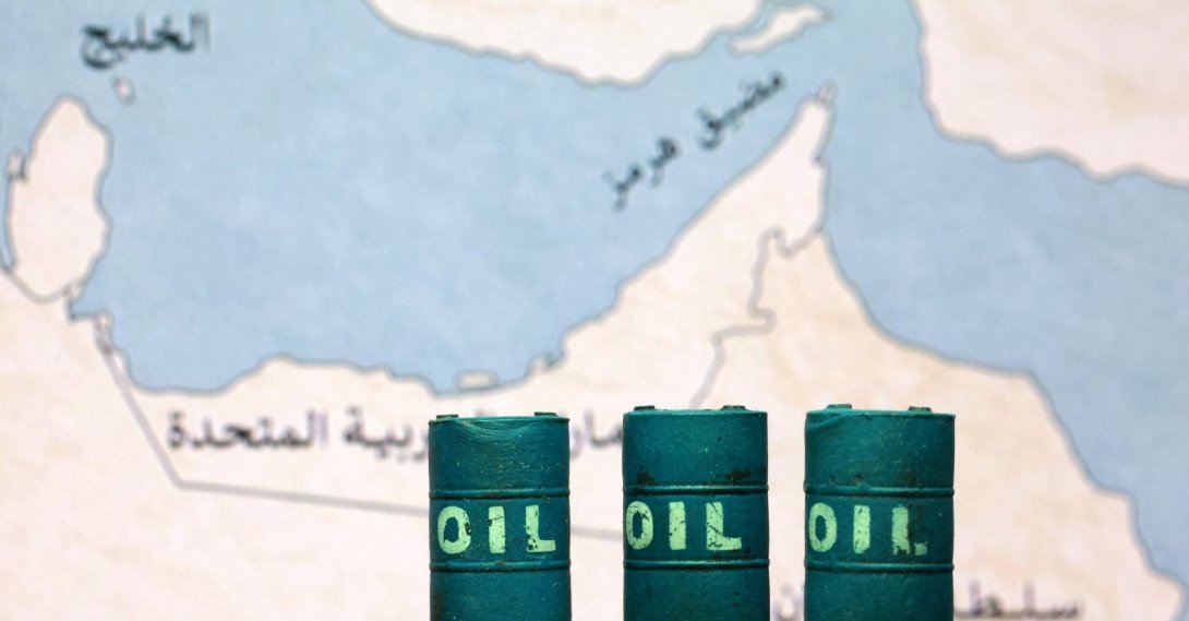 A map showing the Strait of Hormuz, also known as Madiq Hurmuz, and 3D printed oil barrels are seen in this illustration taken March 26, 2026. (Reuters Photo)
