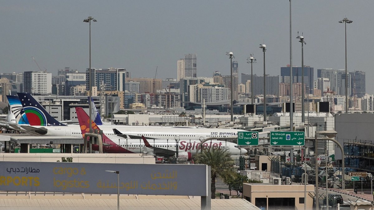 Passenger planes are parked at Dubai International Airport, Dubai, United Arab Emirates (UAE), March 11, 2026. (AFP Photo)