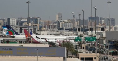 Passenger planes are parked at Dubai International Airport, Dubai, United Arab Emirates (UAE), March 11, 2026. (AFP Photo)