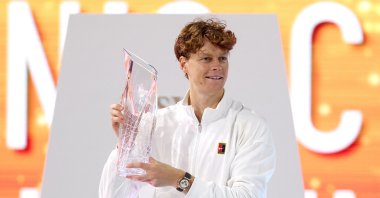 Italy's Jannik Sinner poses with the Butch Buchholz Trophy after defeating Czechia's Jiri Lehecka during the Men's Singles Final of the Miami Open Presented by Itau at Hard Rock Stadium, Miami Gardens, U.S., March 29, 2026. (AFP Photo)