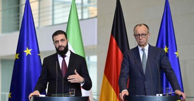 German Chancellor Friedrich Merz and Syrian President Ahmed al-Sharaa address a joint press conference after talks at the Chancellery in Berlin on March 30, 2026. (AFP Photo)