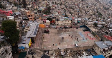 Children play football in Jalouzi, Port-au-Prince, Haiti, March 21, 2026. (AFP Photo)