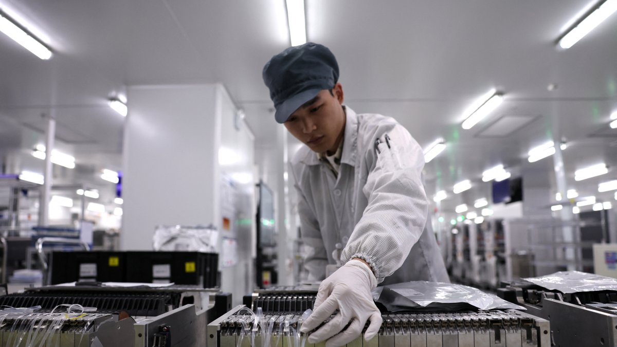An employee works at the factory of Chinese autonomous driving technology startup ZYT, also known as Zhuoyu Technology, Shenzhen, China, March 19, 2026. (Reuters Photo)