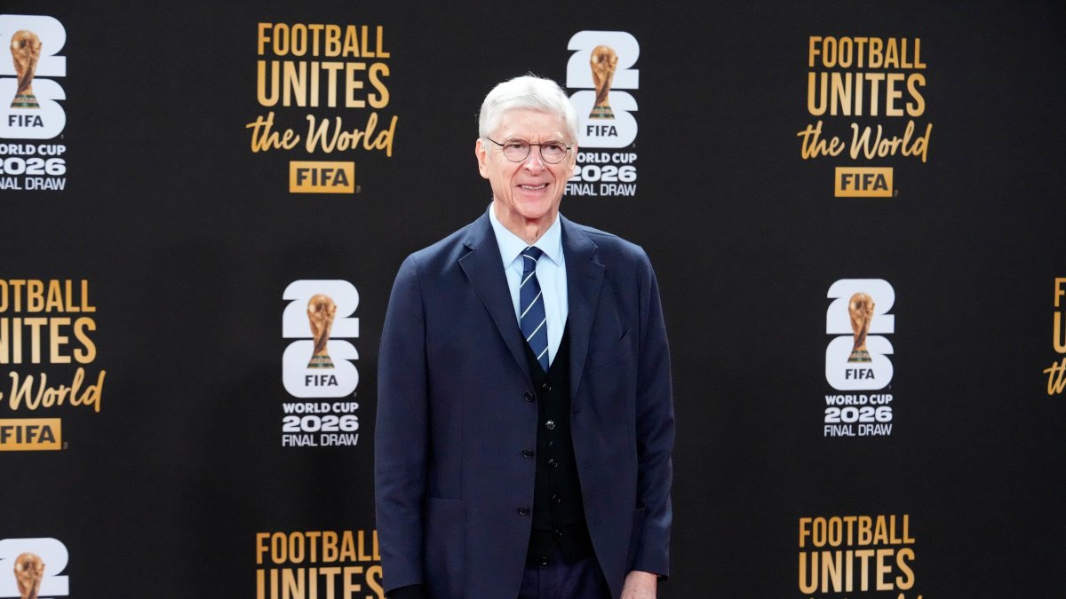 Arsene Wenger poses for photo as he arrives on the red carpet for a welcome reception ahead of the draw for 2026 FIFA World Cup at the Kennedy Center, Washington, U.S., Dec. 4, 2025. (AP Photo)