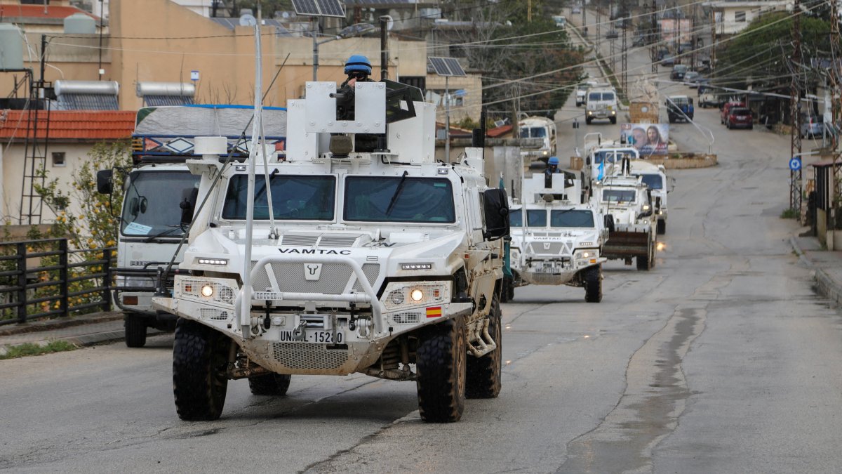 UNIFIL vehicles drive on a main road in Qlayaa, amid escalating hostilities between Israel and Hezbollah, as the U.S.-Israel conflict with Iran continues, in Qlayaa, southern Lebanon, March 27, 2026. (Reuters File Photo)