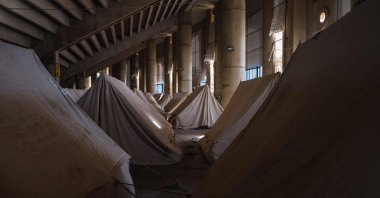 Tents pitched inside the Camille Chamoun Sports City stadium, which was converted into a reception and shelter facility for displaced people, Beirut, Lebanon, March 27, 2026. (AFP Photo)
