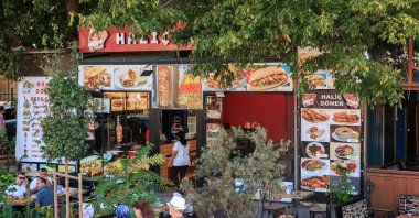 A local Turkish restaurant with the menu hanging outside, Istanbul, Türkiye, Aug. 12, 2025. (Shutterstock Photo)