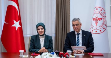 Family and Social Services Minister Mahinur Özdemir Göktaş (L) and Health Minister Kemal Memişoğlu (R) attend the signing ceremony, Ankara, Türkiye, March 31, 2026. (AA Photo)
