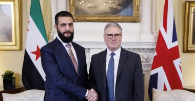British Prime Minister Keir Starmer (R) welcomes the President of Syria, Ahmed al-Sharaa (L), to Downing Street in London, Britain, March 31, 2026. (EPA Photo)
