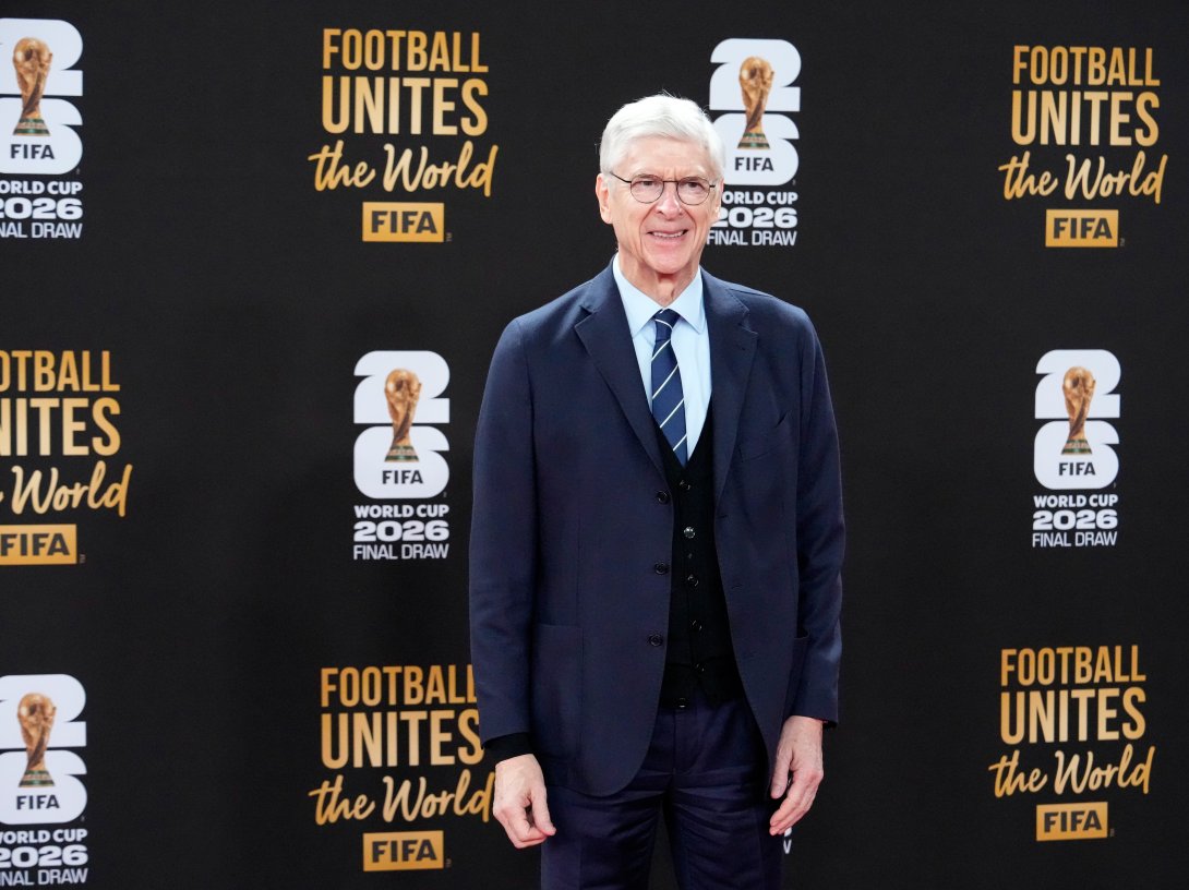 Arsene Wenger poses for photo as he arrives on the red carpet for a welcome reception ahead of the draw for 2026 FIFA World Cup at the Kennedy Center, Washington, U.S., Dec. 4, 2025. (AP Photo)
