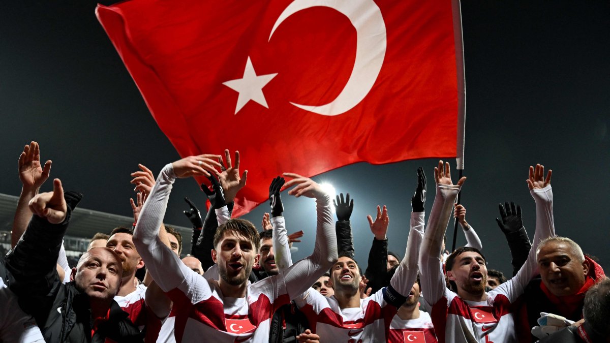 Turkish players celebrate after winning the FIFA World Cup 2026 European qualification final against Kosovo, in Pristina, Kosovo, March 31, 2026. (AFP Photo)