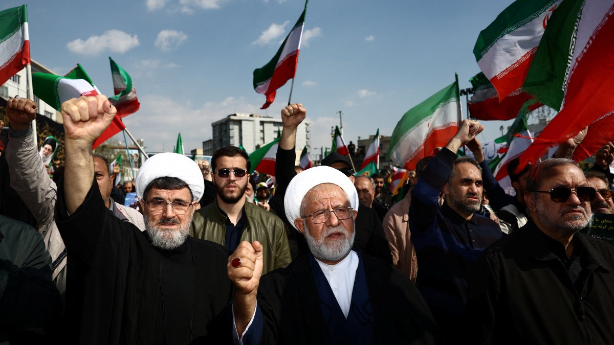 People attend a funeral ceremony for the Revolutionary Guards Navy Commander Alireza Tangsiri, killed in U.S/Israeli strikes, in Tehran, Iran, April 1, 2026. (Reuters Photo)