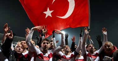 Turkish players celebrate after winning the FIFA World Cup 2026 European qualification final against Kosovo, in Pristina, Kosovo, March 31, 2026. (AFP Photo)
