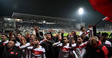 Türkiye's players celebrate after winning at the end of the FIFA World Cup 2026 European qualification final football match against Kosovo at the Fadil Vokrri stadium, Pristina, March 31, 2026. (AFP Photo)