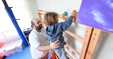 A 3.5-year-old child receives occupational therapy at the Autism Family Counseling Center, Mersin, Türkiye, March 26, 2026. (IHA Photo)