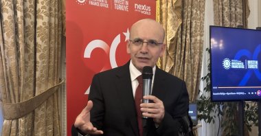 Treasury and Finance Minister Mehmet Şimşek speaks during an event, London, Britain, March 31, 2026. (AA Photo)