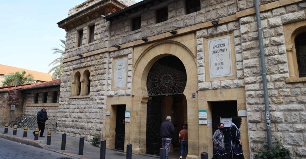 People walk past the main gate of the campus of the American University of Beirut (AUB) in the center of Beirut, Jan. 13, 2022. (AFP File Photo)