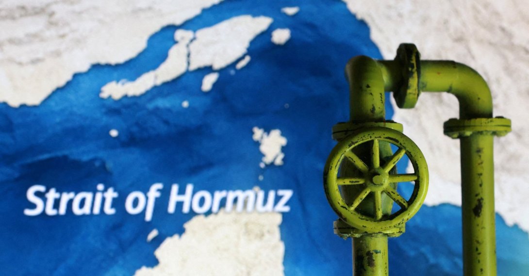 A map showing the Strait of Hormuz and a 3D printed oil pipeline are seen in this illustration taken on March 23, 2026. (Reuters Photo)