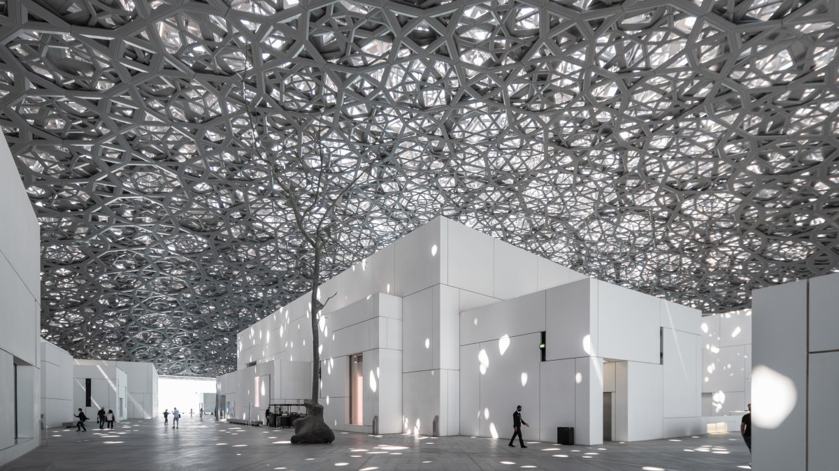 An interior view of the Louvre Abu Dhabi, showing reflections of the "Rain of Light" dome, Abu Dhabi, UAE, March 17, 2022. (Shutterstock Photo)