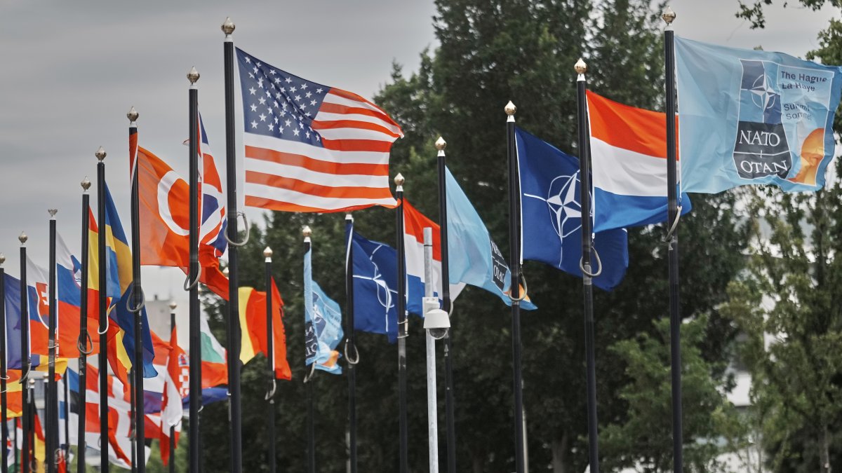 Participants' flags wave in the wind in front of the venue ahead of the NATO summit in The Hague, Netherlands, June 23, 2025. (AP Photo)