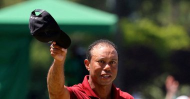 Tiger Woods of the U.S. acknowledges the crowd on the green on the 18th hole after completing his final round during the Masters at the Augusta National Golf Club, Augusta, U.S., April 14, 2024. (Reuters Photo)