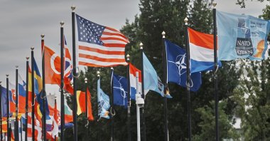Participants' flags wave in the wind in front of the venue ahead of the NATO summit in The Hague, Netherlands, June 23, 2025. (AP Photo)