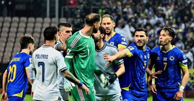 Bosnia-Herzegovina's Sead Kolasinac (2nd R) intervenes during a scuffle between Italy's Gianluigi Donnarumma (C) and Bosnia-Herzegovina's (R) during the FIFA World Cup 2026 European qualification final football match between Bosnia-Herzegovina and Italy at the Bilino-Polje stadium, Zenica, Bosnia and Herzegovina, March 31, 2026. (AFP Photo)