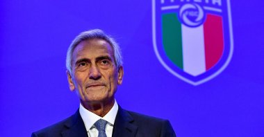 New Italian Football Federation (FIGC) President Gabriele Gravina poses with the federation&amp;amp;#039;s logo following the vote at the FIGC&amp;amp;#039;s elective assembly at Rome&amp;amp;#039;s Fiumicino airport, Italy, Oct. 22, 2018. (AFP Photo)